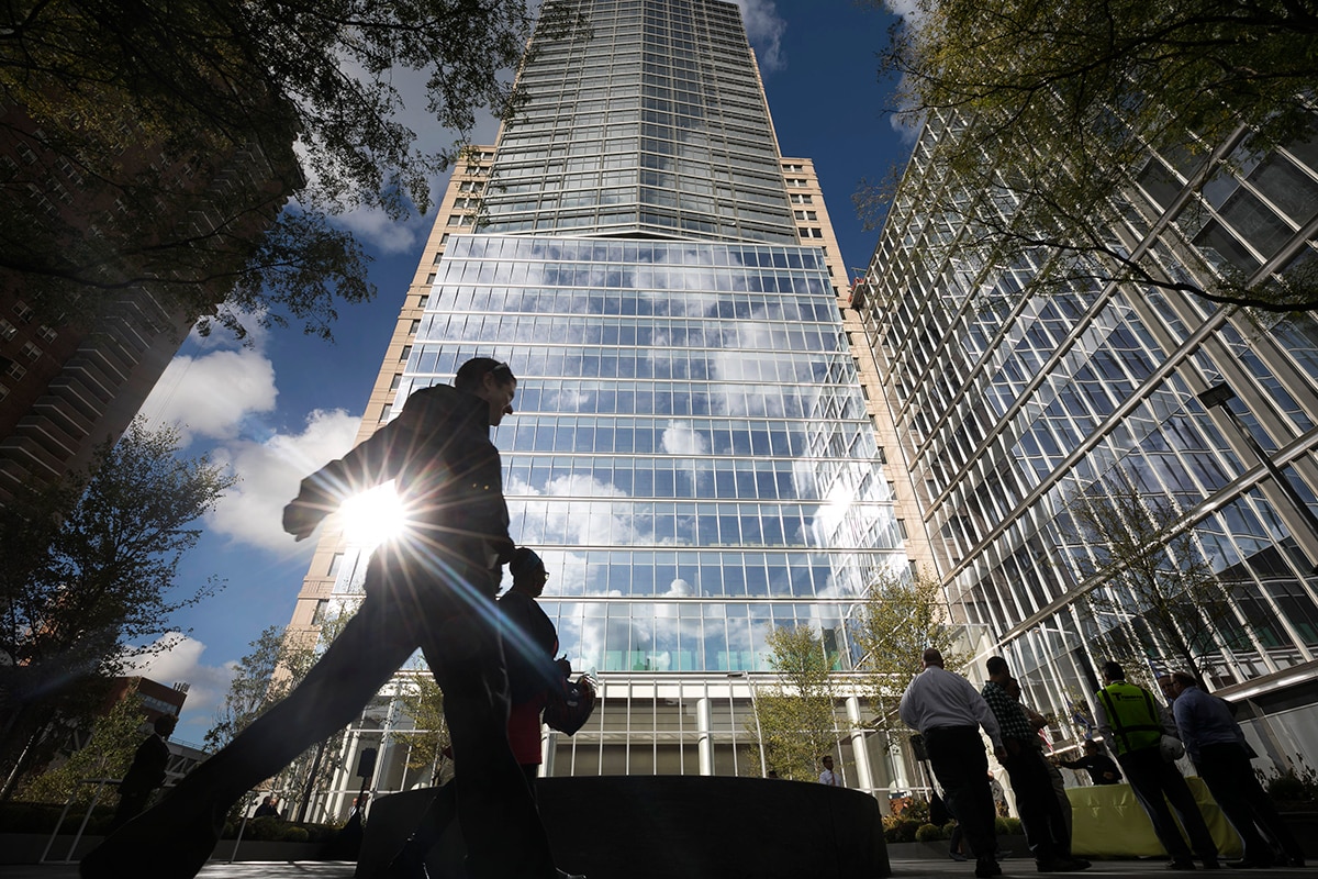 Person walking in front of building